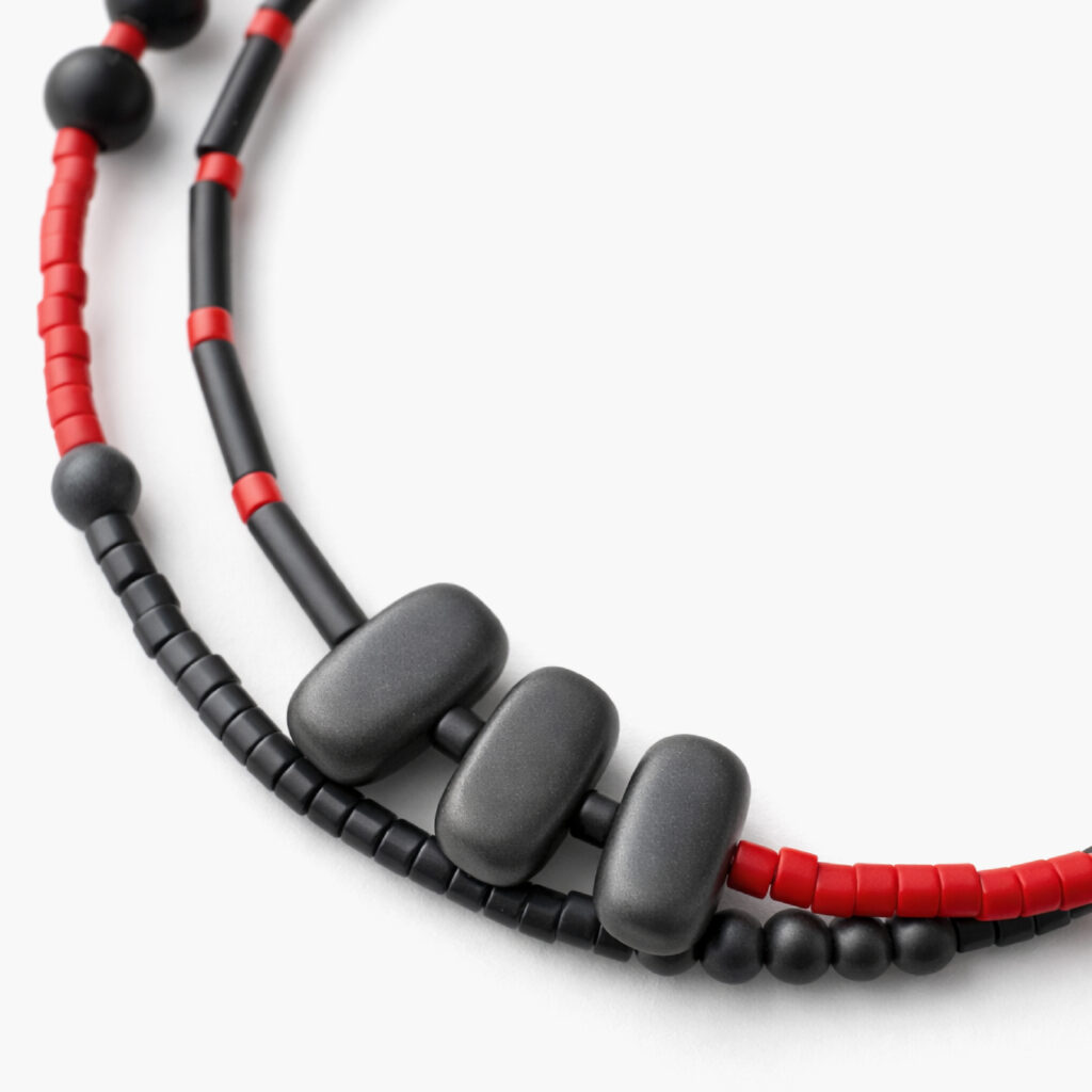 Black red and grey beaded bracelet – close-up detail