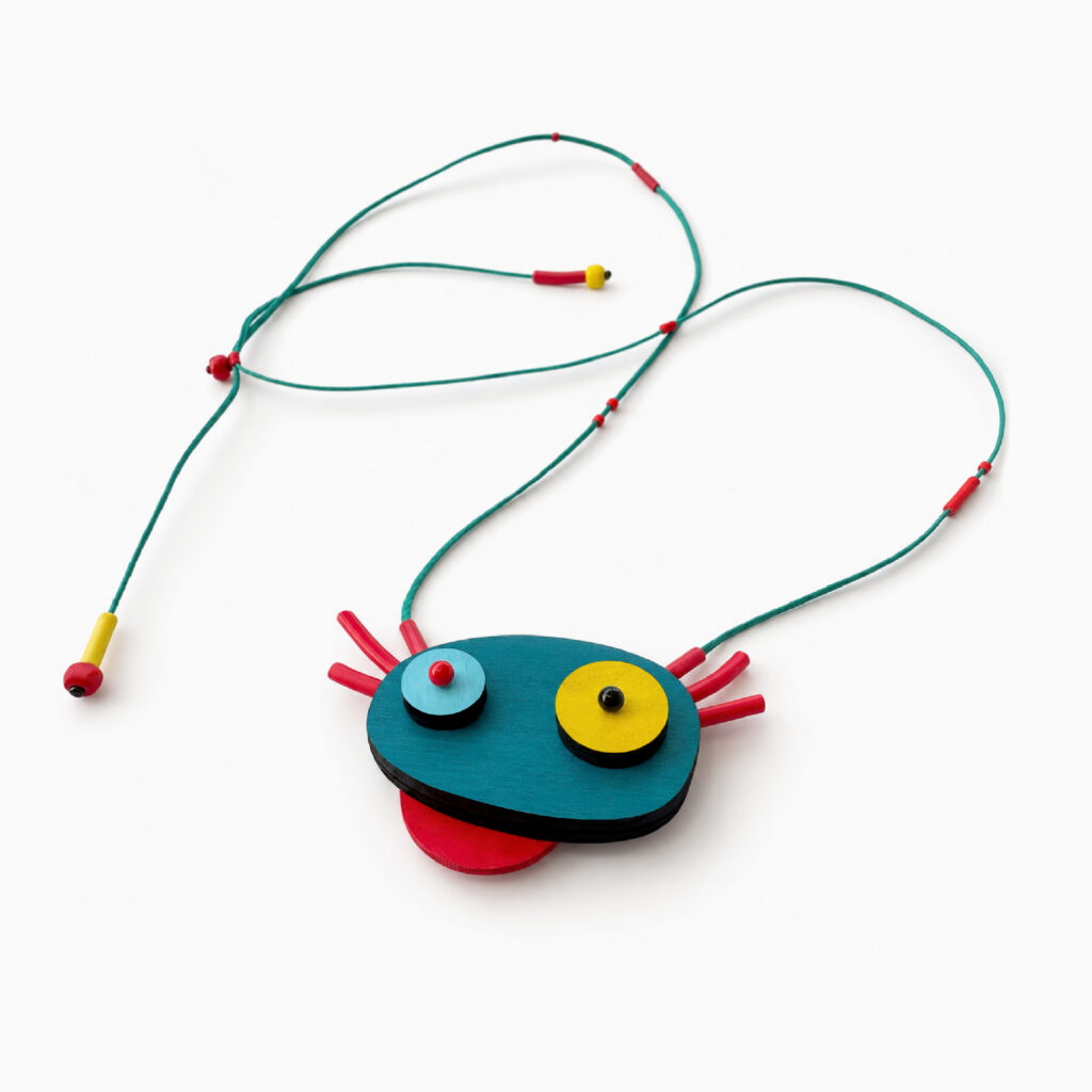 Colorful abstract axolotl statement necklace with adjustable cord on white background