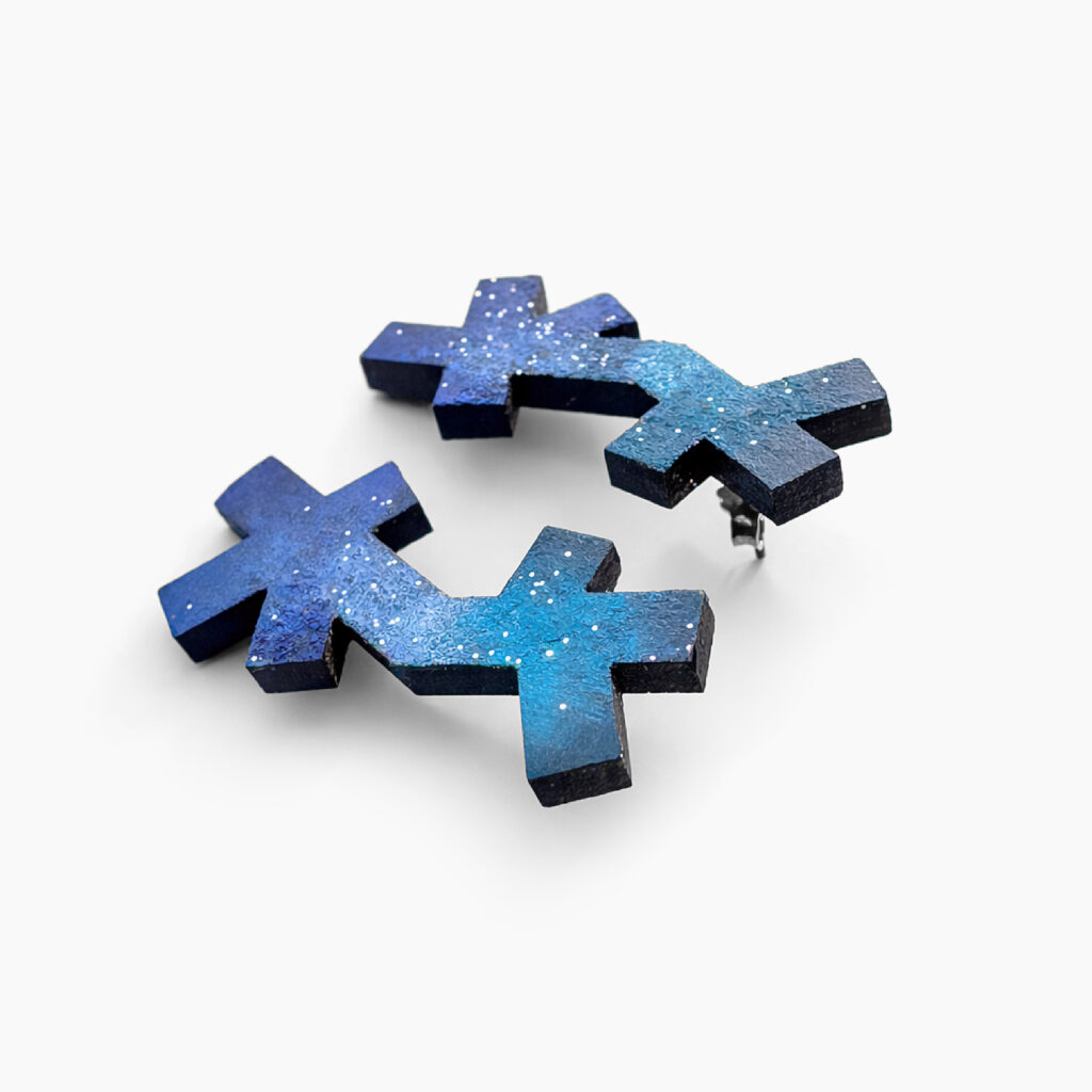 Blue abstract geometric stud earrings showing layered wooden details – angled view