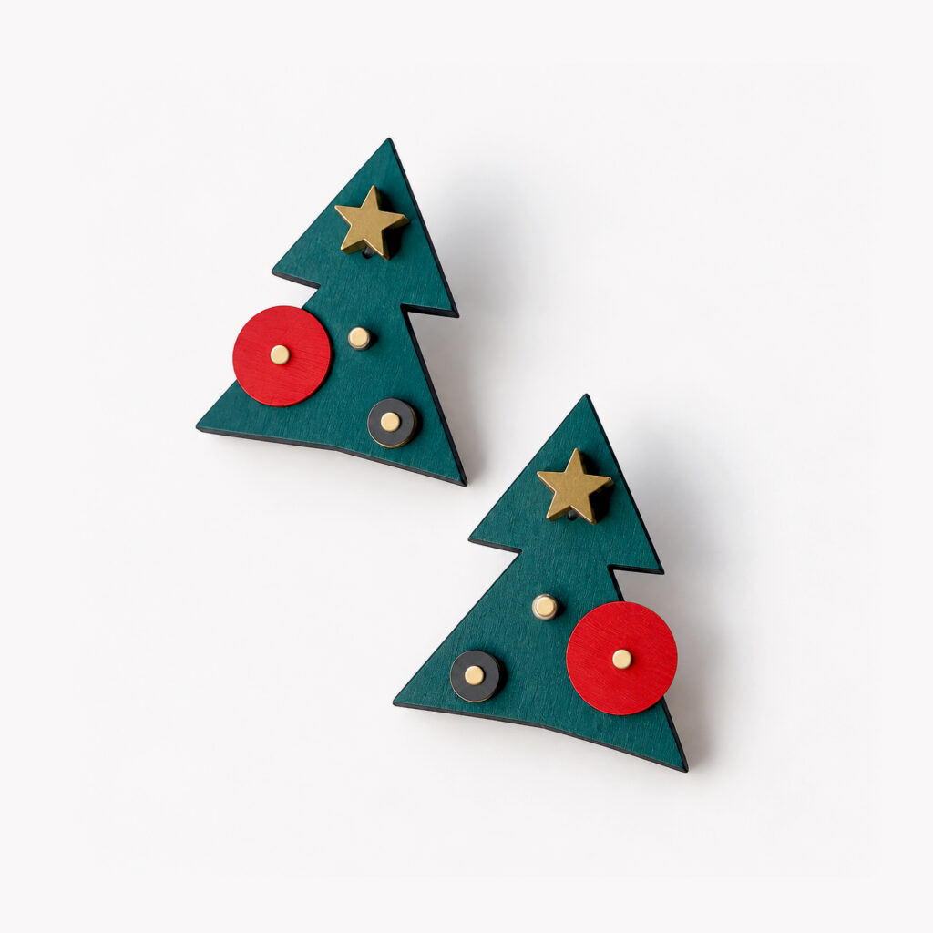 Pair of green Christmas tree stud earrings with red circular ornaments and gold stars