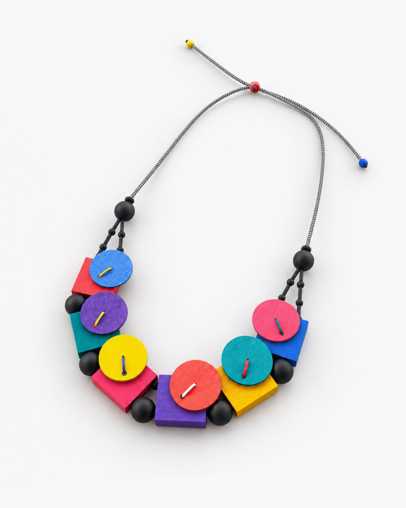 Multicolor geometric statement necklace with adjustable grey cord